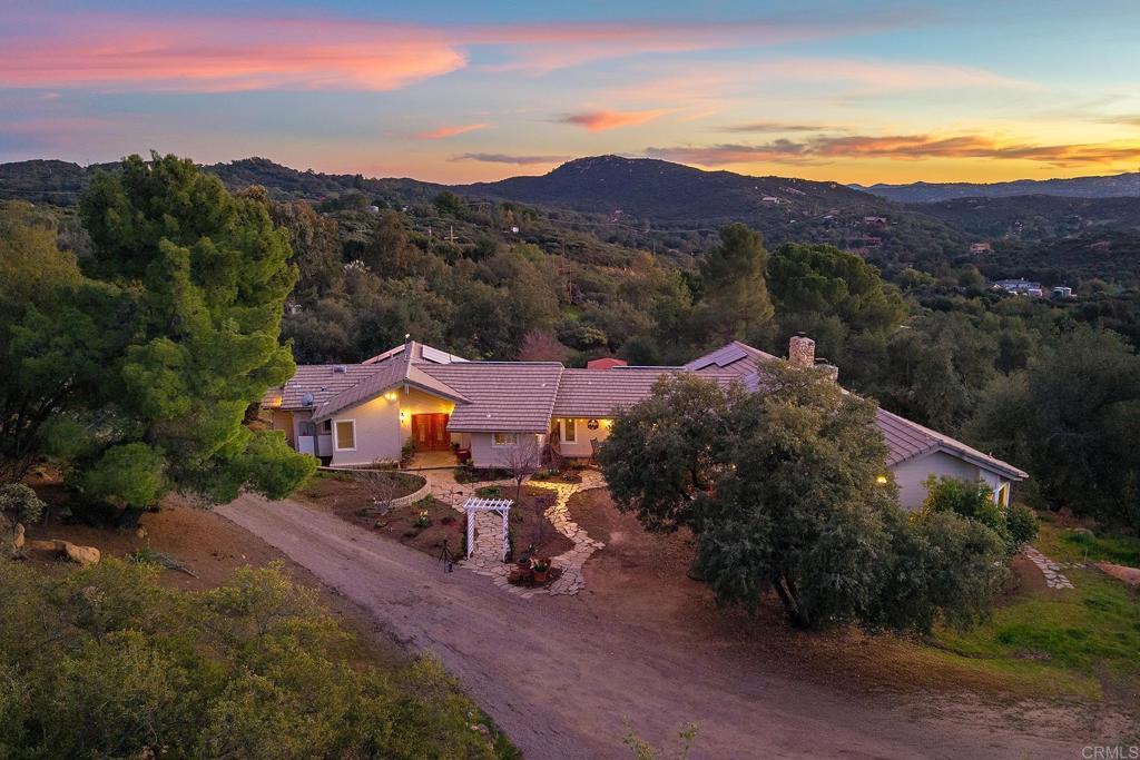 23002 Japatul Valley Road Alpine, CA 91901 - Photo 54 of 65 an aerial view of a house with mountain view