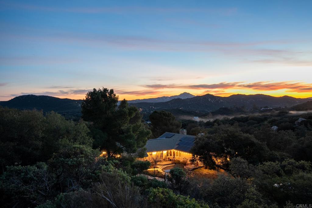 23002 Japatul Valley Road Alpine, CA 91901 - Photo 56 of 65 a view of a lake in middle of the house