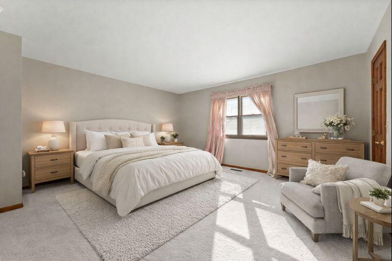 176 Wexford Road Valparaiso, IN 46385 - Photo 21 of 47 a bedroom with a large bed and a window