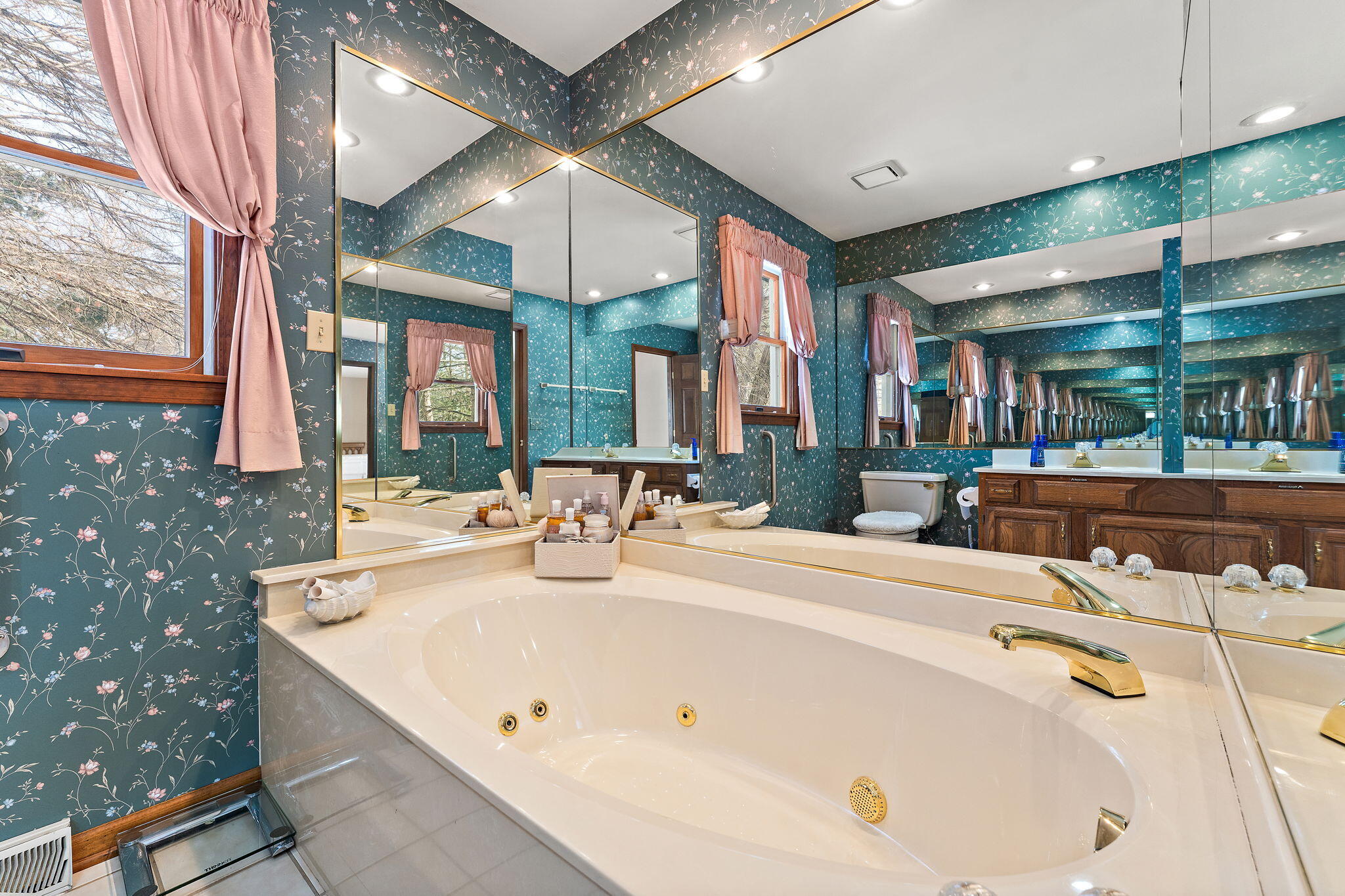 176 Wexford Road Valparaiso, IN 46385 - Photo 25 of 47 a bathroom with a sink and a large mirror