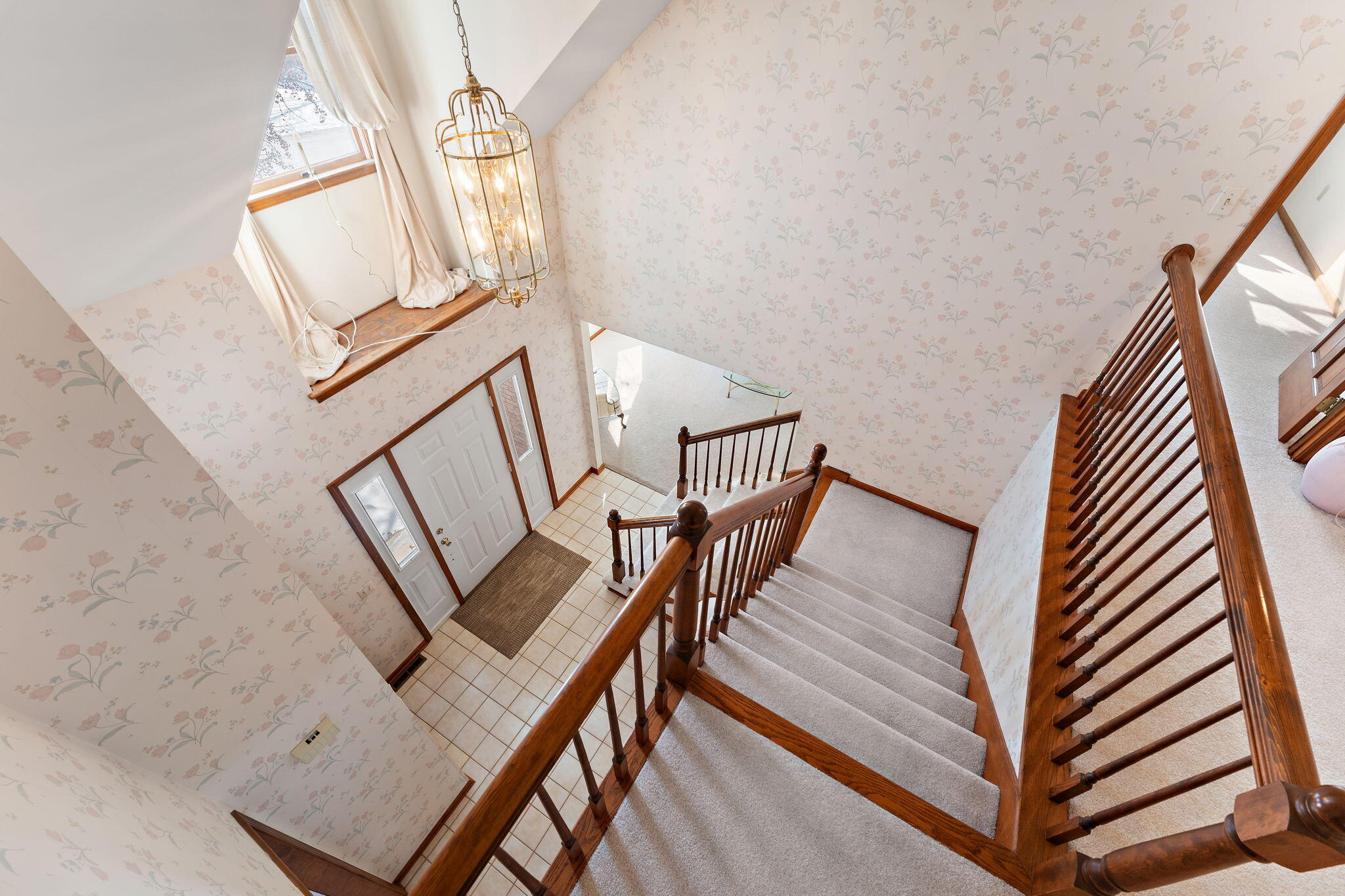 176 Wexford Road Valparaiso, IN 46385 - Photo 30 of 54 a view of a livingroom with wooden floor and stairs