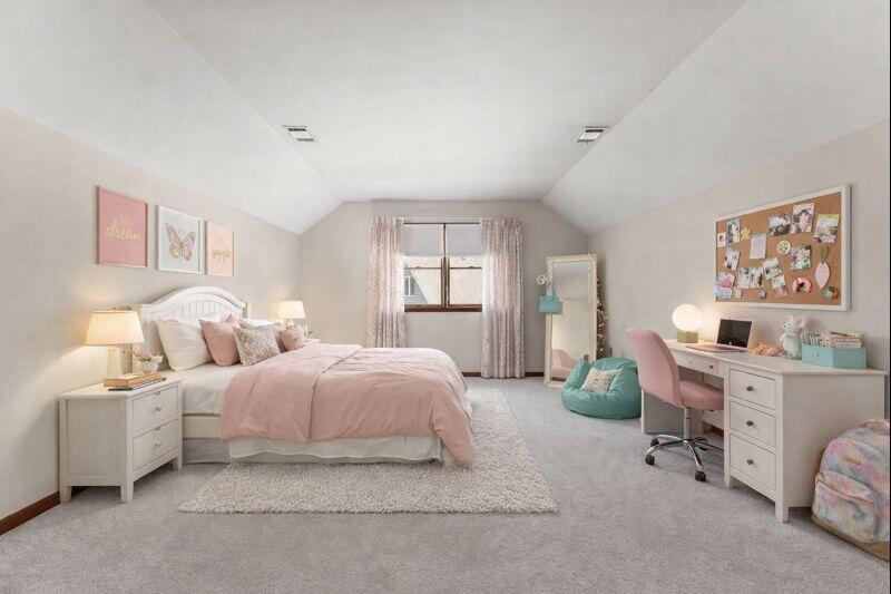 176 Wexford Road Valparaiso, IN 46385 - Photo 31 of 47 a bedroom with bed and a large mirror