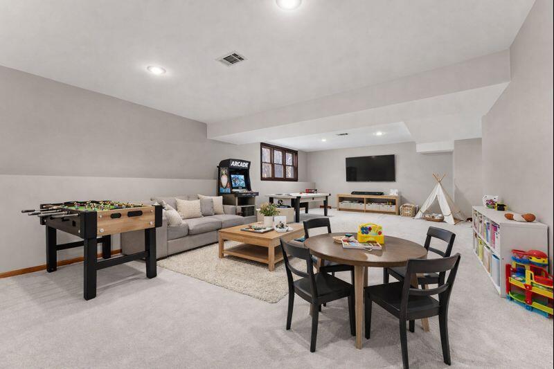 176 Wexford Road Valparaiso, IN 46385 - Photo 35 of 47 a living room with furniture and a flat screen tv