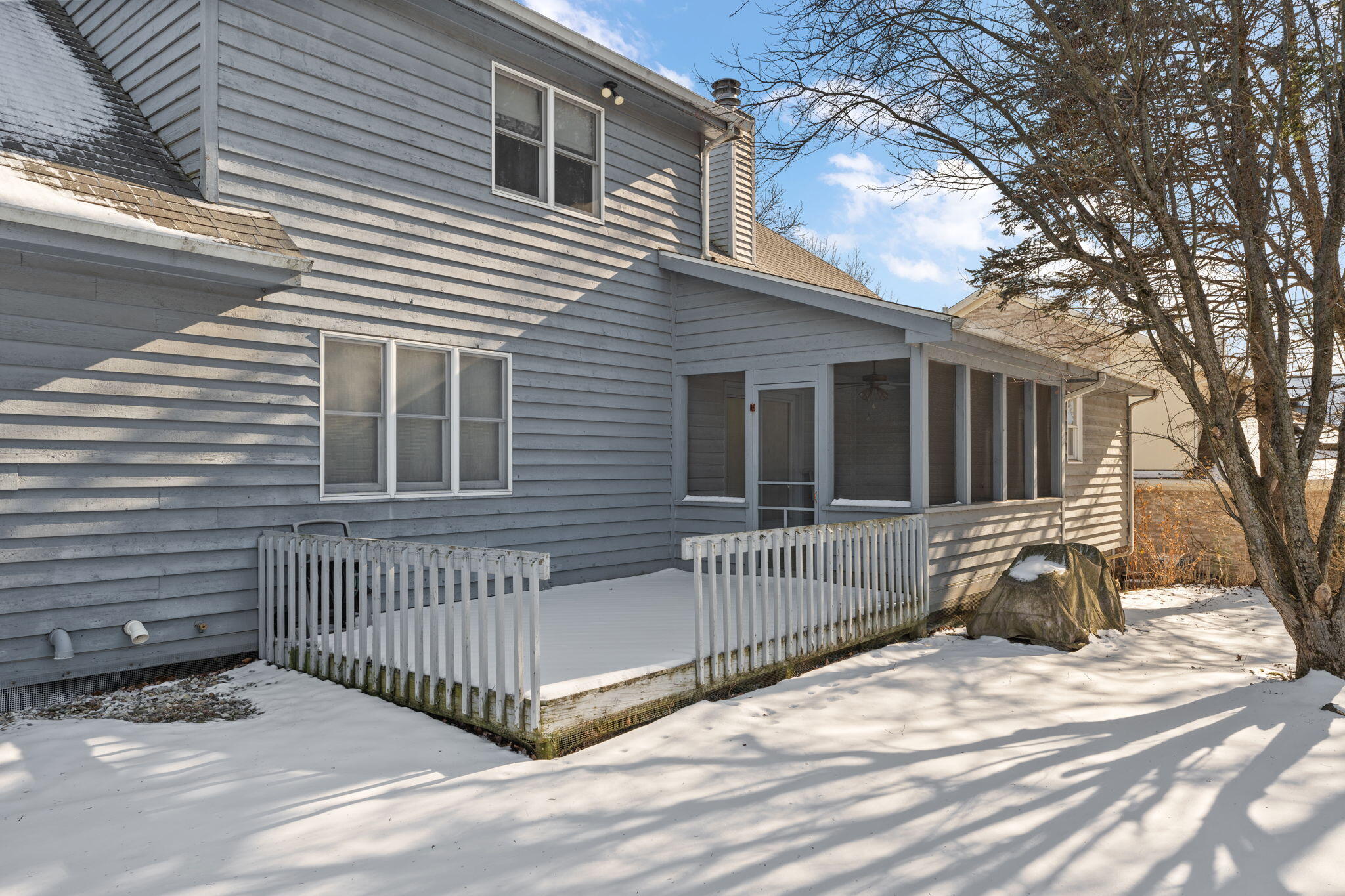 176 Wexford Road Valparaiso, IN 46385 - Photo 41 of 47 a view of a house with a small yard and wooden fence