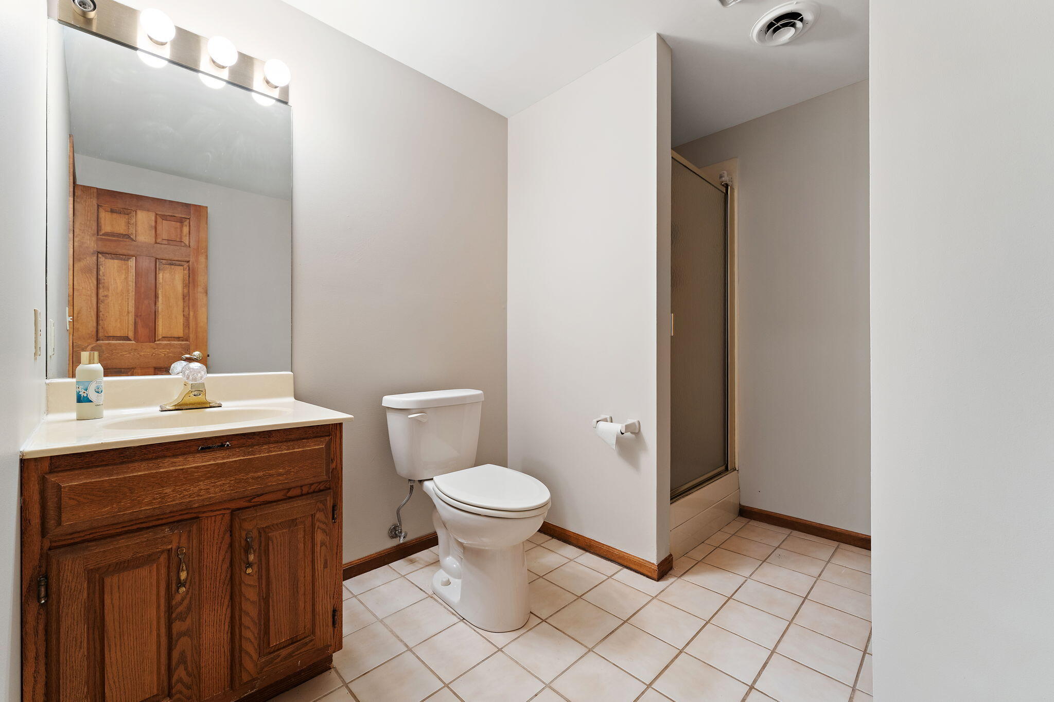 176 Wexford Road Valparaiso, IN 46385 - Photo 41 of 54 a bathroom with a sink toilet and mirror