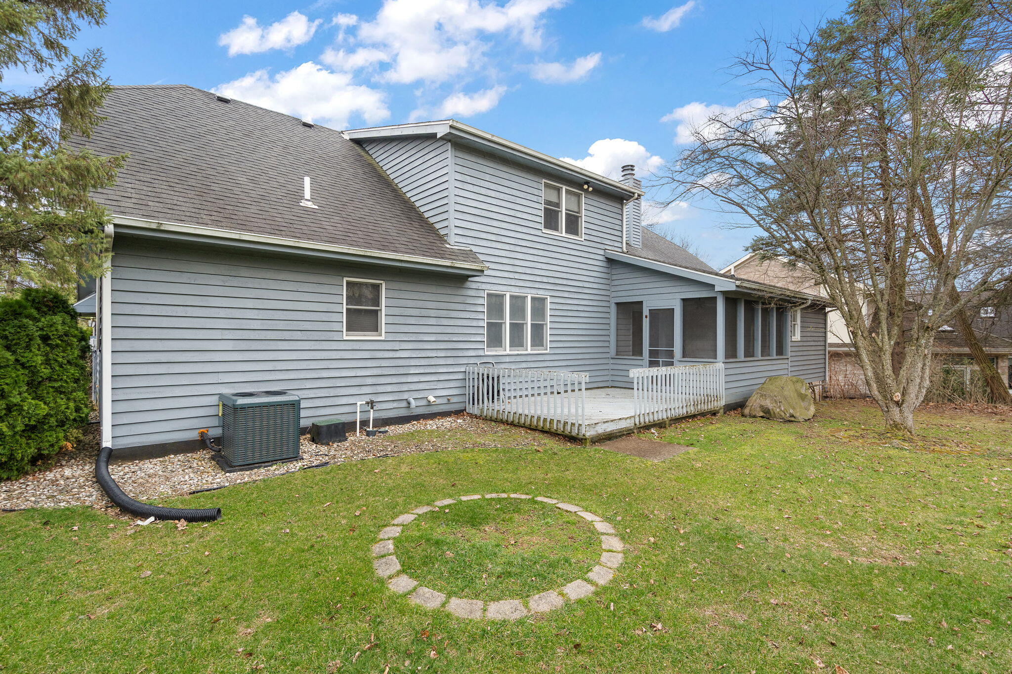 176 Wexford Road Valparaiso, IN 46385 - Photo 44 of 54 a view of a house with a backyard and a tree