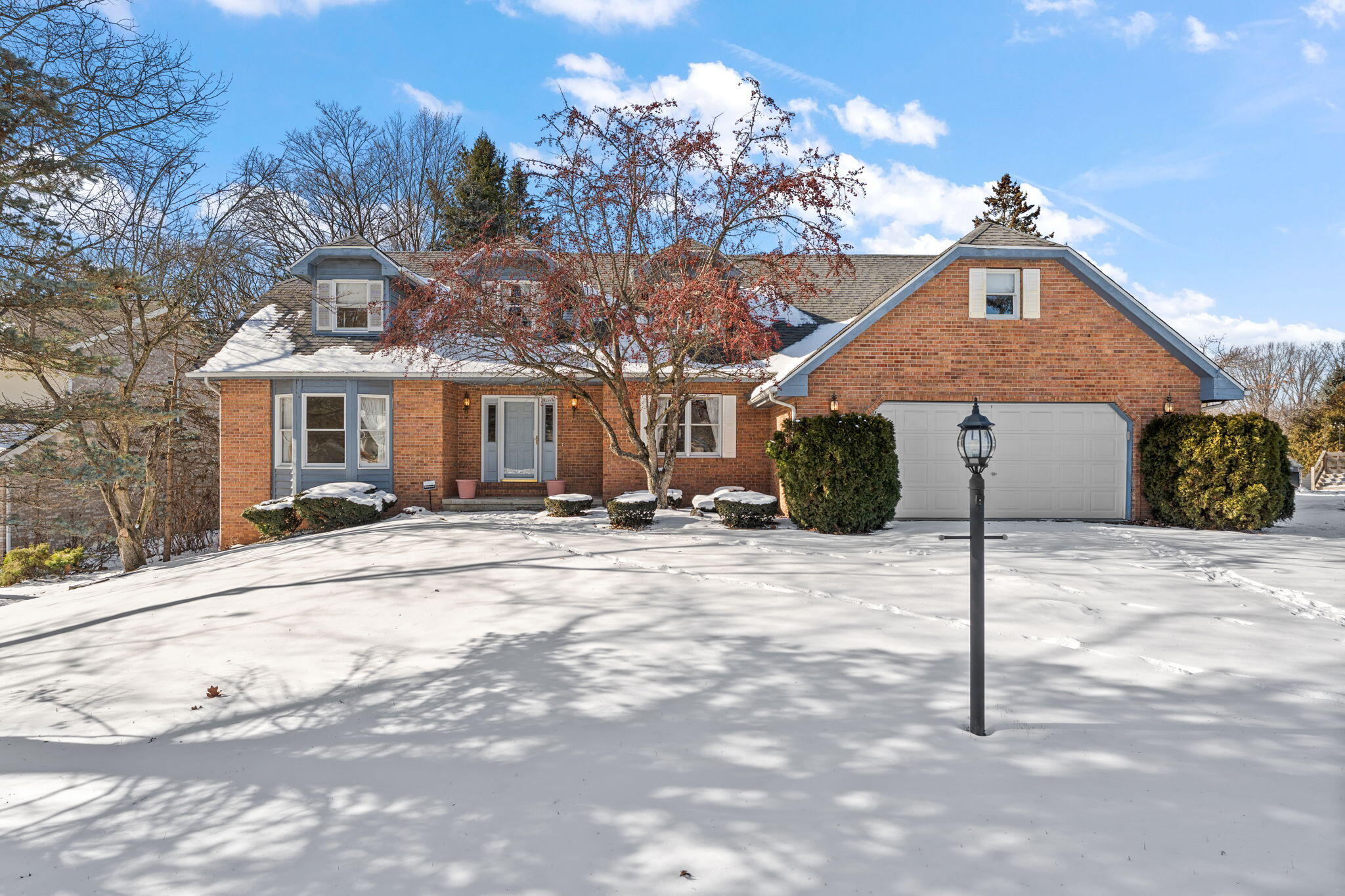 176 Wexford Road Valparaiso, IN 46385 - Photo 46 of 47 a front view of a house with a yard