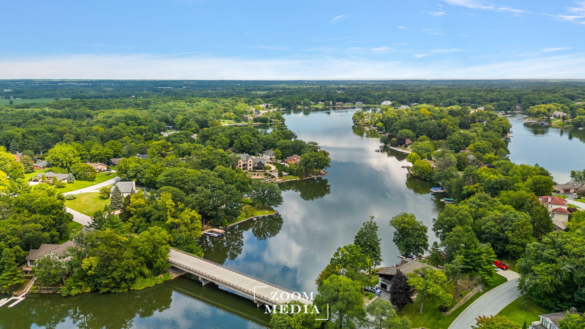 176 Wexford Road Valparaiso, IN 46385 - Photo 53 of 54 an aerial view of green landscape with trees houses and lake view