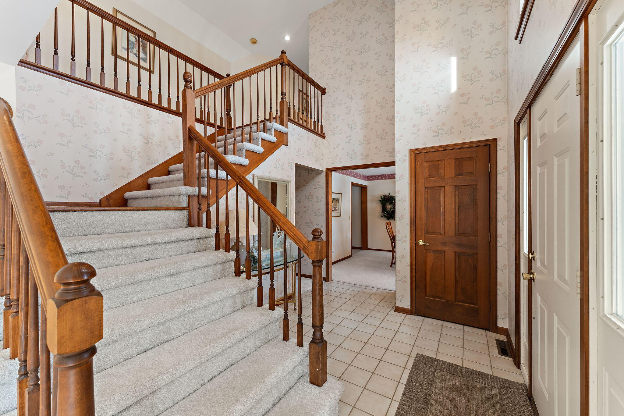 176 Wexford Road Valparaiso, IN 46385 - Photo 6 of 54 a view of entryway and hall with wooden floor