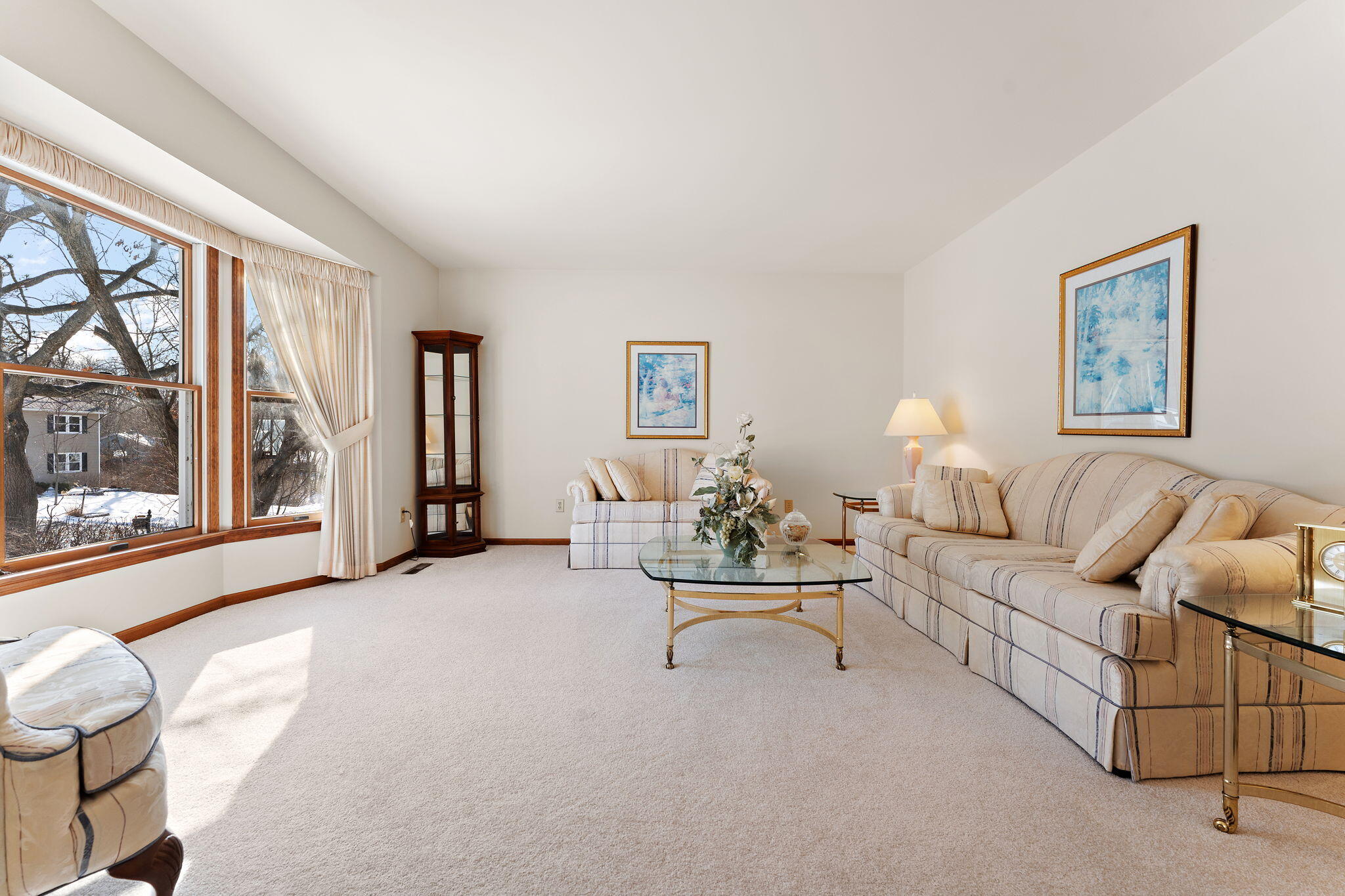 176 Wexford Road Valparaiso, IN 46385 - Photo 7 of 47 a living room with furniture and a large window