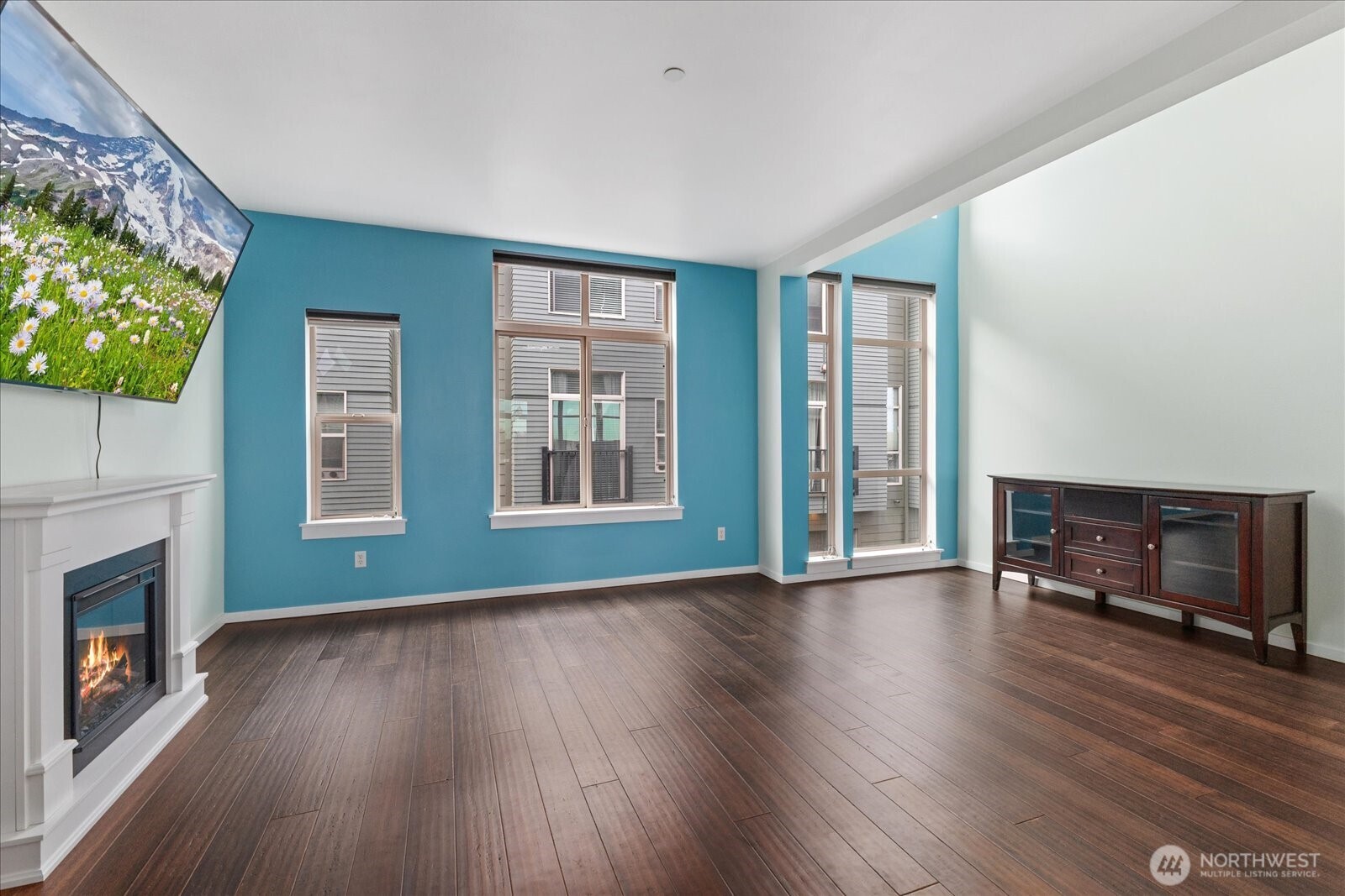 2132 South G Street Tacoma, WA 98405 - Photo 11 of 40 a view of an empty room with a window and wooden floor