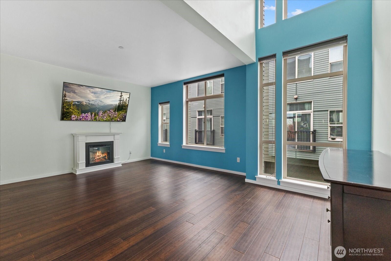 2132 South G Street Tacoma, WA 98405 - Photo 16 of 40 a view of an empty room with glass door and wooden floor