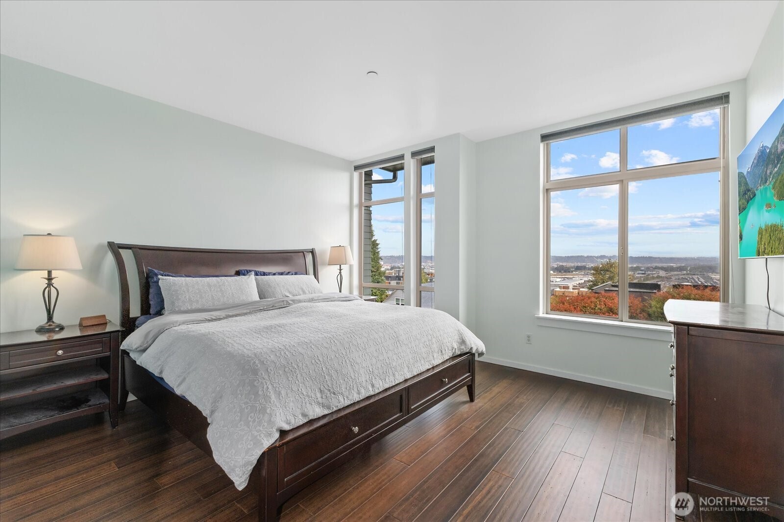 2132 South G Street Tacoma, WA 98405 - Photo 23 of 40 a large bed sitting in a bedroom next to a window