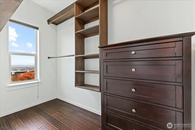 a view of dresser and window