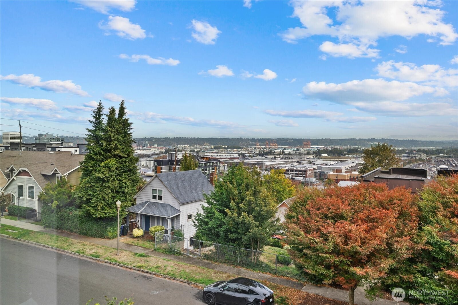 2132 South G Street Tacoma, WA 98405 - Photo 8 of 40 an aerial view of residential houses with outdoor space and ocean