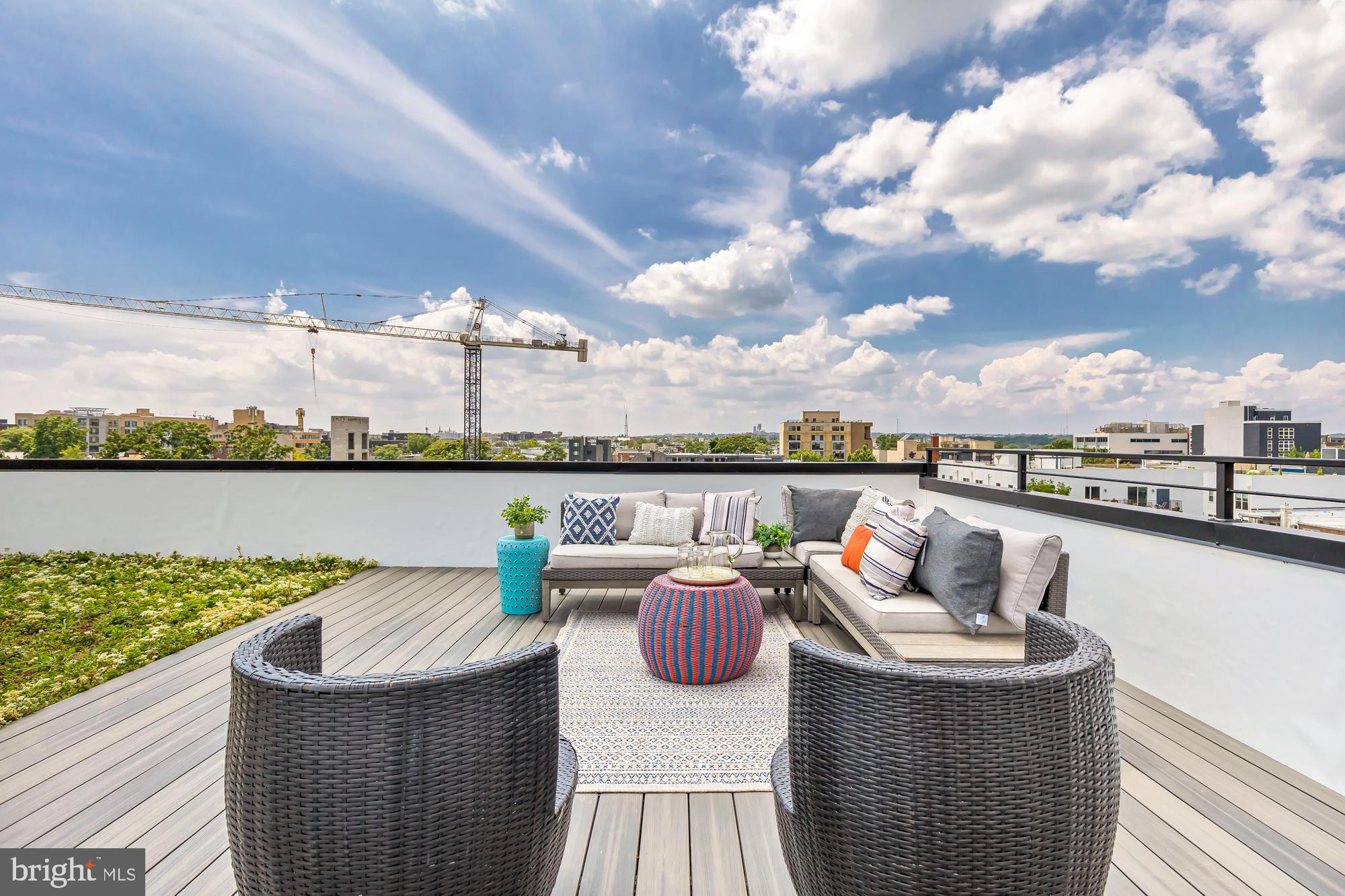 a view of a balcony with city view