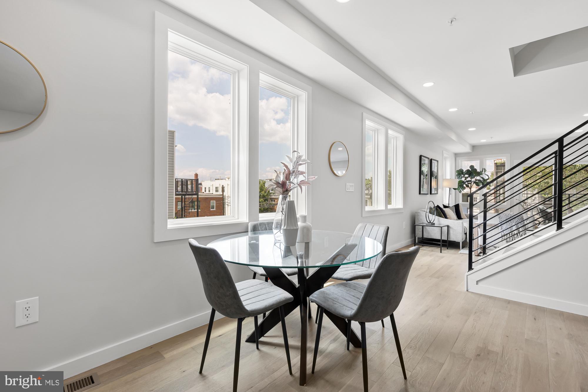 537 Park Road Northwest, Unit TH2 Washington, DC 20010 - Photo 23 of 60 a dining room with furniture and window