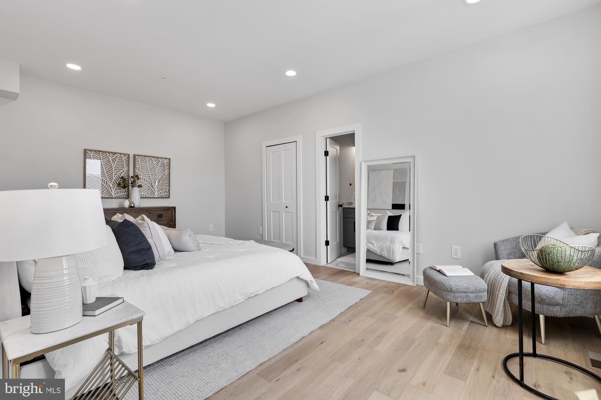 537 Park Road Northwest, Unit TH2 Washington, DC 20010 - Photo 27 of 60 a bedroom with a bed and a table