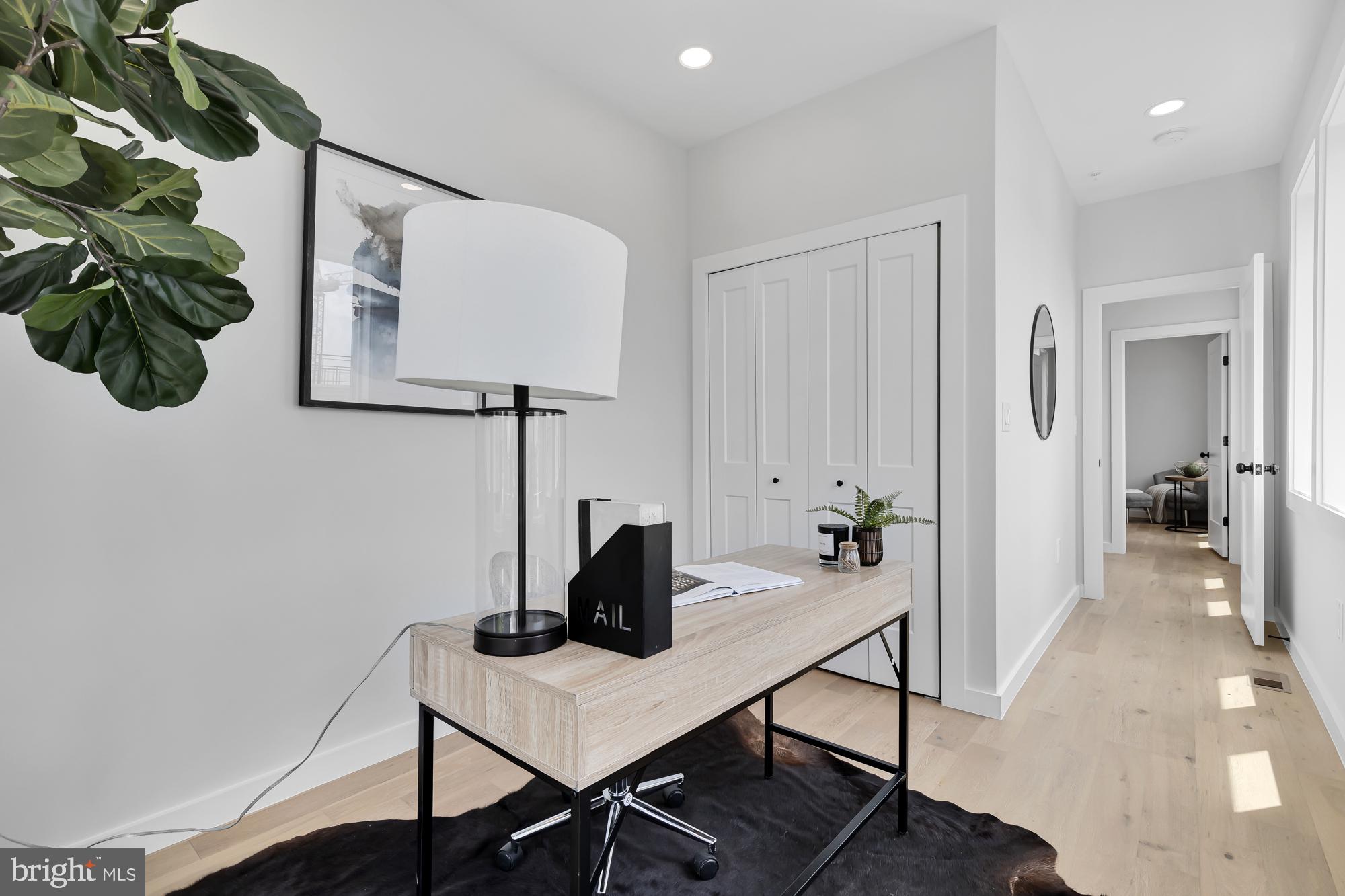 537 Park Road Northwest, Unit TH2 Washington, DC 20010 - Photo 36 of 60 a view of a workspace with furniture