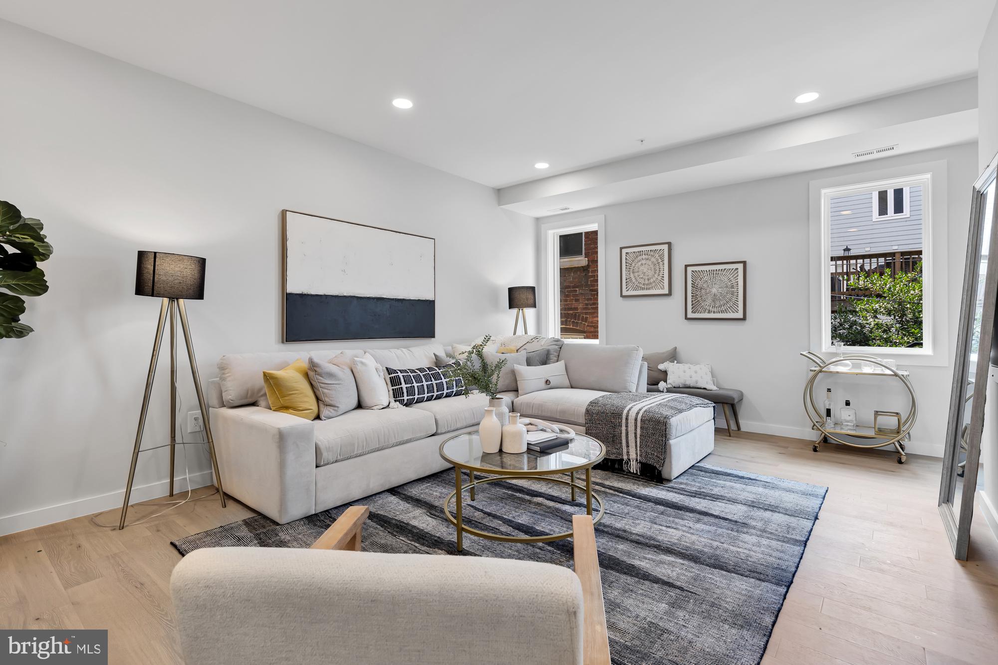 537 Park Road Northwest, Unit TH2 Washington, DC 20010 - Photo 48 of 60 a living room with furniture and a couch