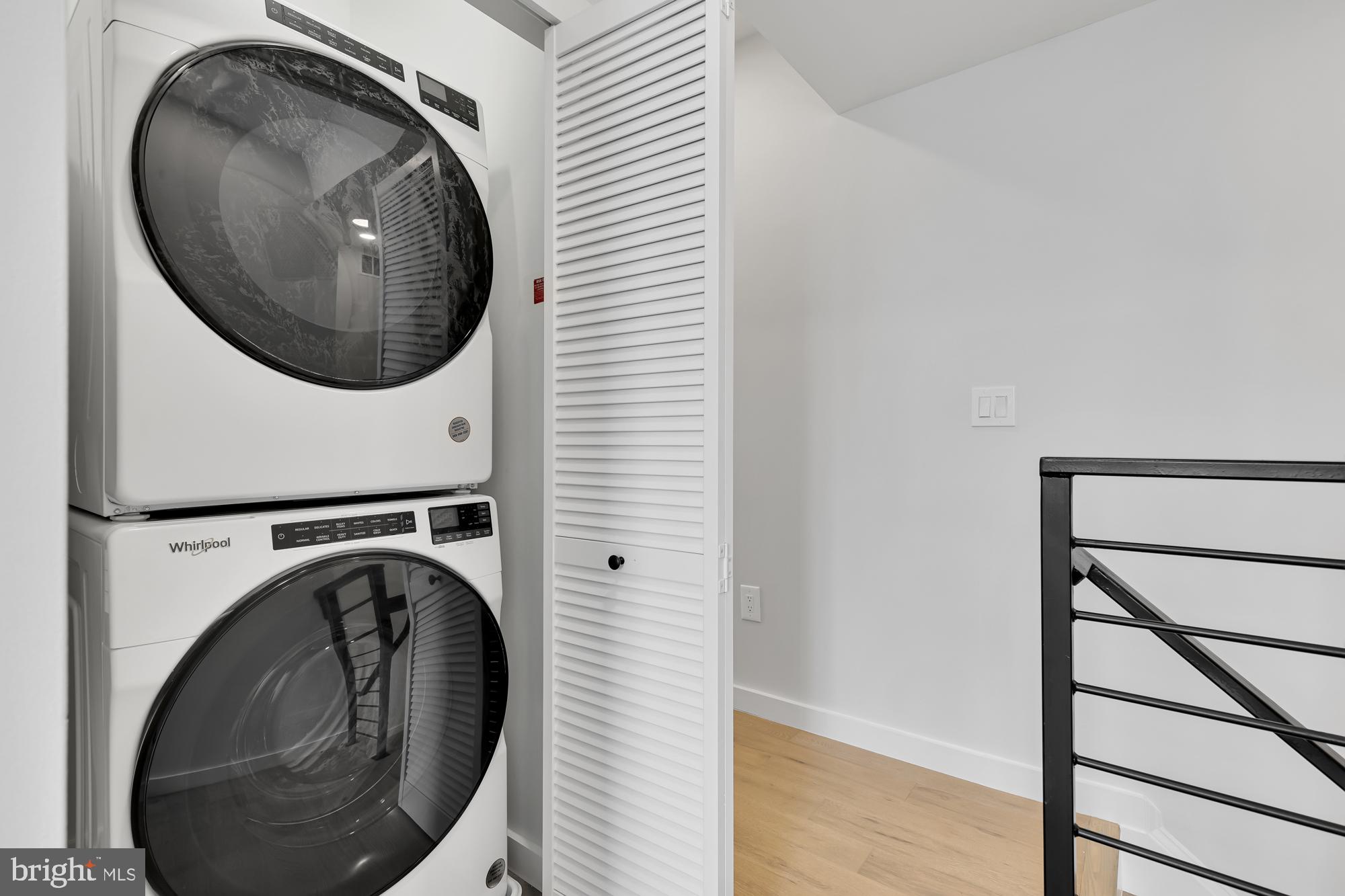 537 Park Road Northwest, Unit TH2 Washington, DC 20010 - Photo 50 of 60 a utility room with dryer and washer