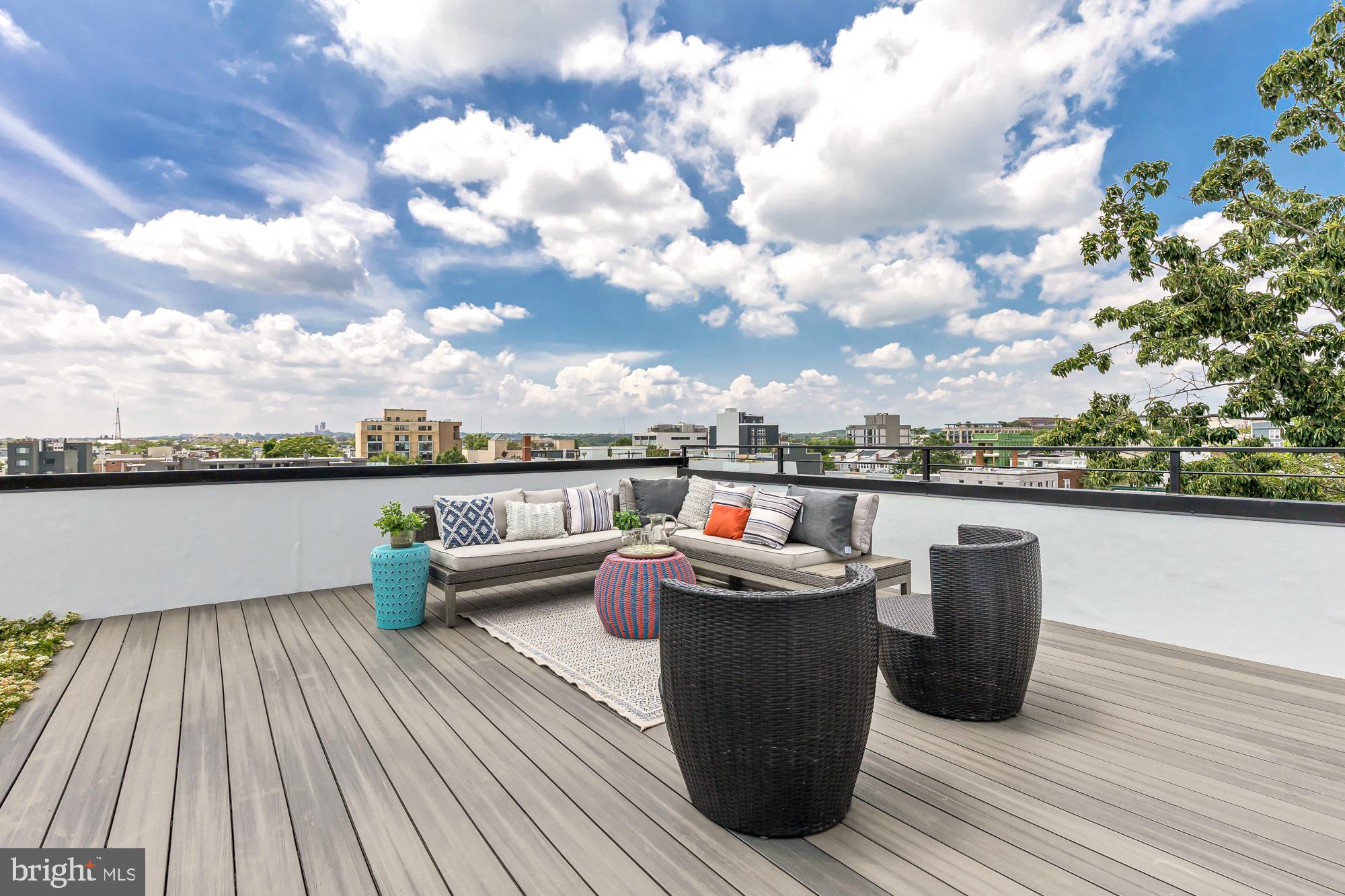 537 Park Road Northwest, Unit TH2 Washington, DC 20010 - Photo 52 of 60 a view of a terrace with furniture