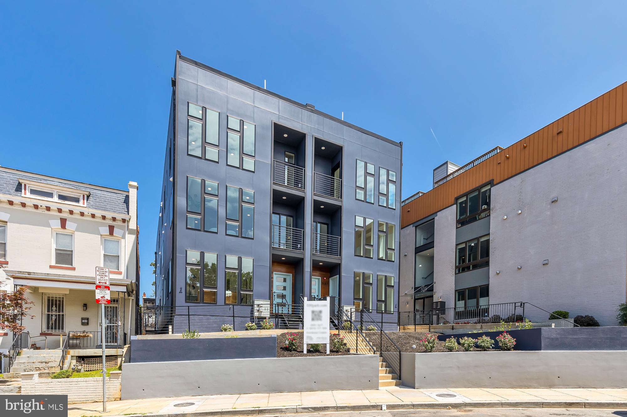 537 Park Road Northwest, Unit TH2 Washington, DC 20010 - Photo 58 of 60 a front view of a building with street
