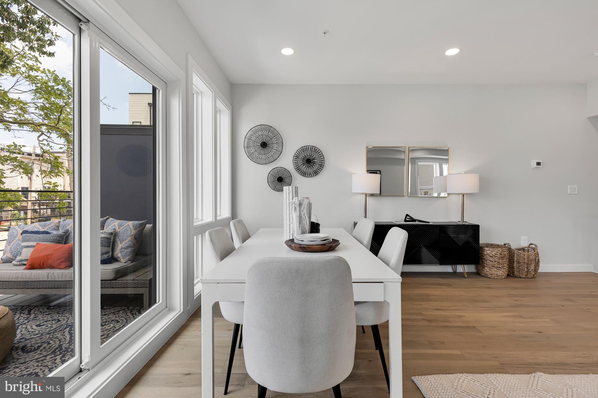 537 Park Road Northwest, Unit TH2 Washington, DC 20010 - Photo 9 of 60 a view of livingroom with furniture and wooden floor