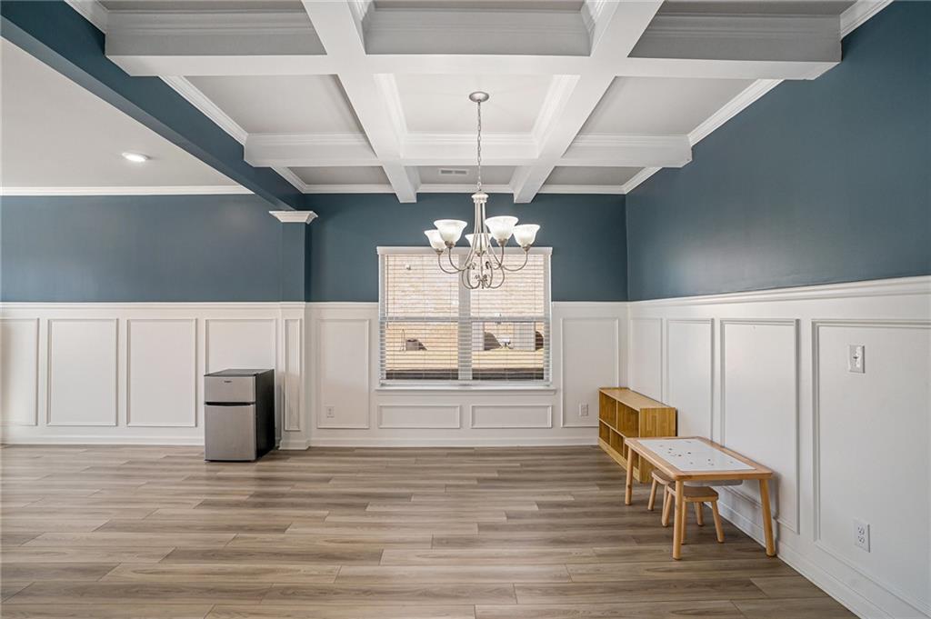 453 Sawmill Trace Hampton, GA 30228 - Photo 6 of 34 a view of a livingroom with furniture and wooden floor