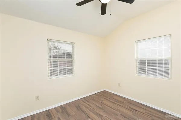an empty room with windows
