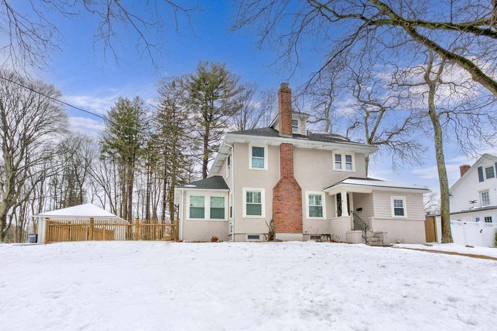front view of a house with a yard