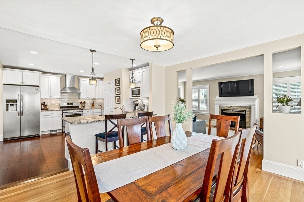 7 Perkins Avenue Reading, MA 01867 - Photo 13 of 42 a view of a dining room with furniture window and wooden floor