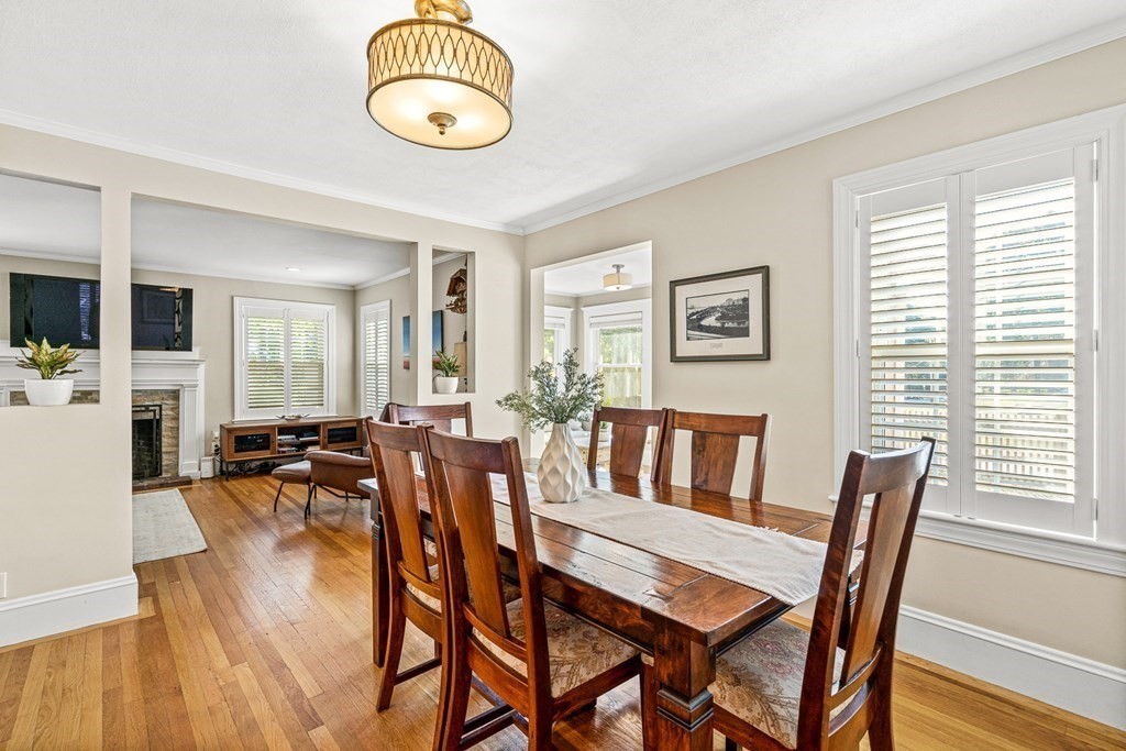 7 Perkins Avenue Reading, MA 01867 - Photo 15 of 42 a view of a dining room with furniture window and wooden floor