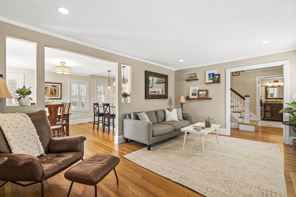 7 Perkins Avenue Reading, MA 01867 - Photo 19 of 42 a living room with furniture and a wooden floor
