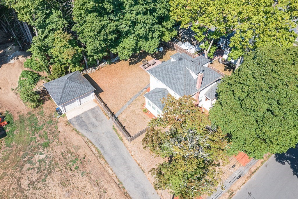 7 Perkins Avenue Reading, MA 01867 - Photo 2 of 42 an aerial view of a house with a yard and swimming pool