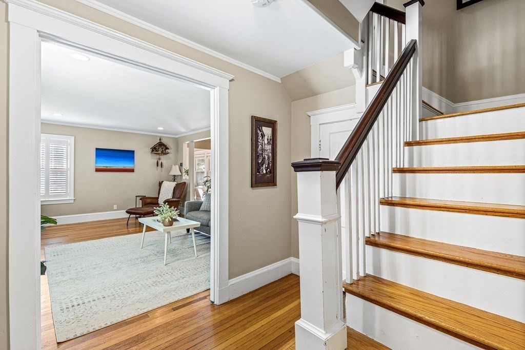 7 Perkins Avenue Reading, MA 01867 - Photo 24 of 42 a view of entryway and hall with wooden floor