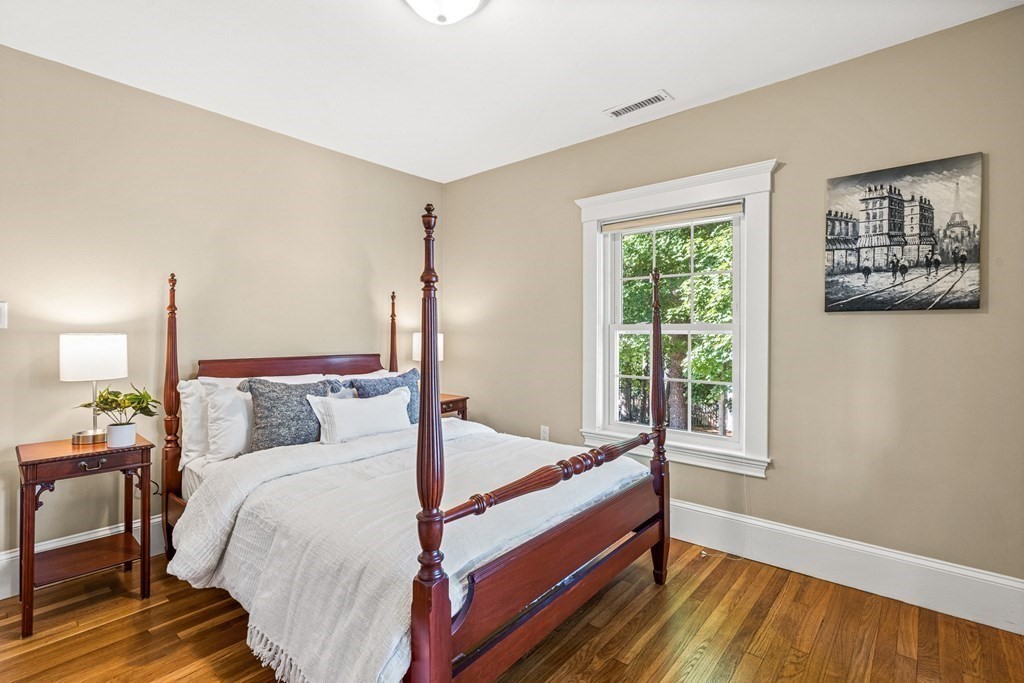 7 Perkins Avenue Reading, MA 01867 - Photo 33 of 42 a bed room with a bed and a window