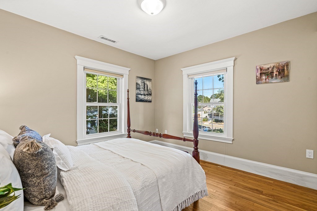 7 Perkins Avenue Reading, MA 01867 - Photo 34 of 42 a bedroom with a bed and a window