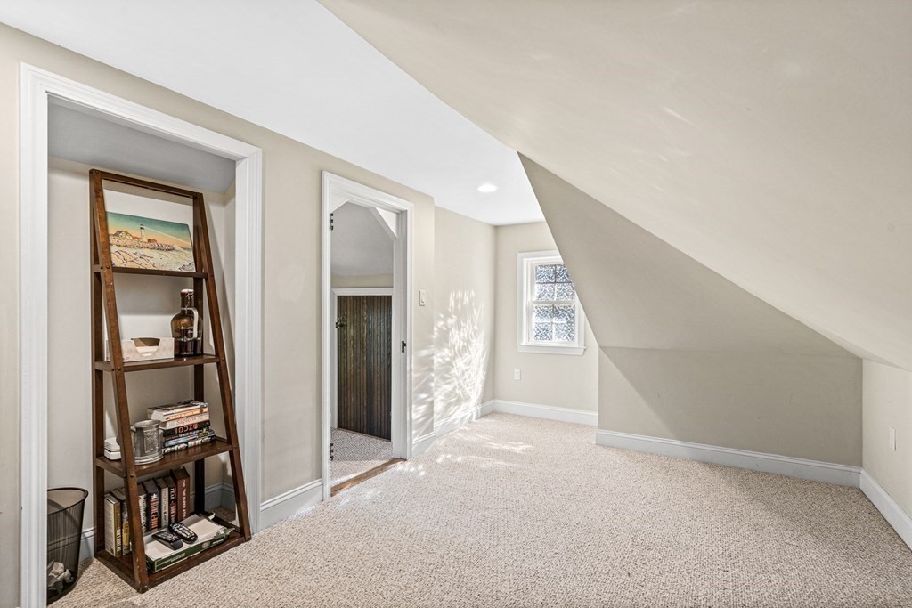 7 Perkins Avenue Reading, MA 01867 - Photo 36 of 42 a view of livingroom with furniture and closet