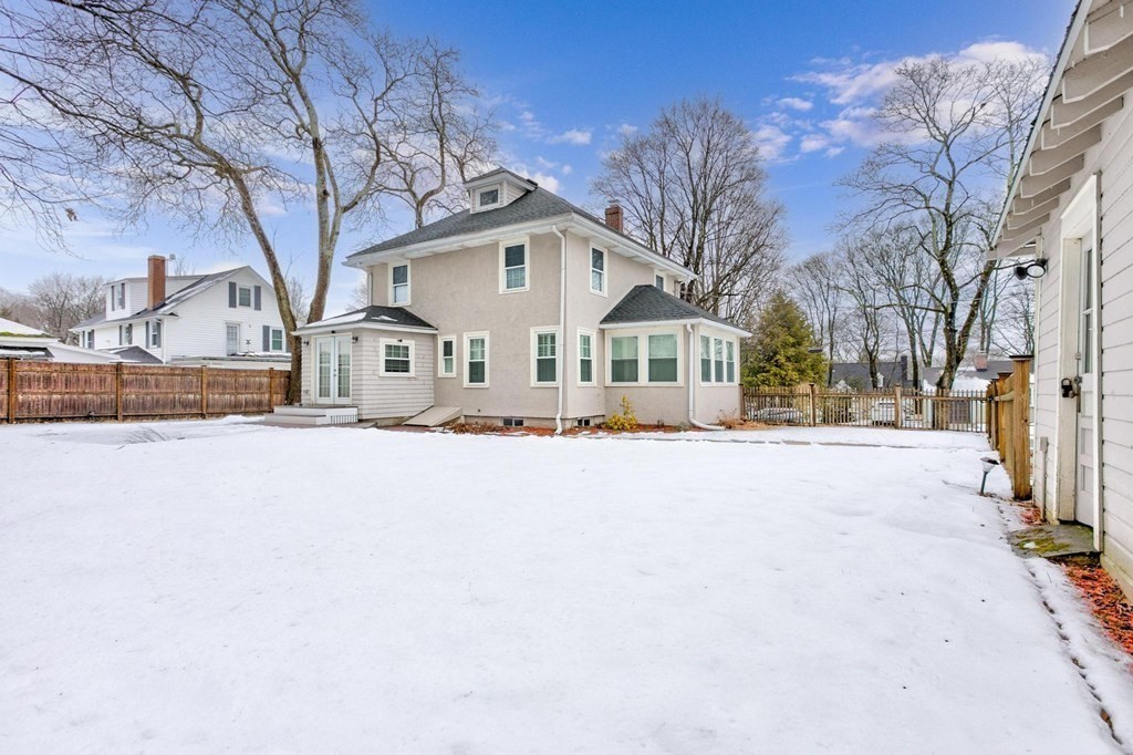 7 Perkins Avenue Reading, MA 01867 - Photo 38 of 42 a street view with large trees