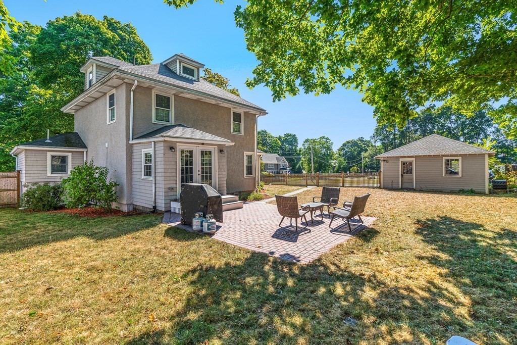 7 Perkins Avenue Reading, MA 01867 - Photo 4 of 42 a front view of a house with patio
