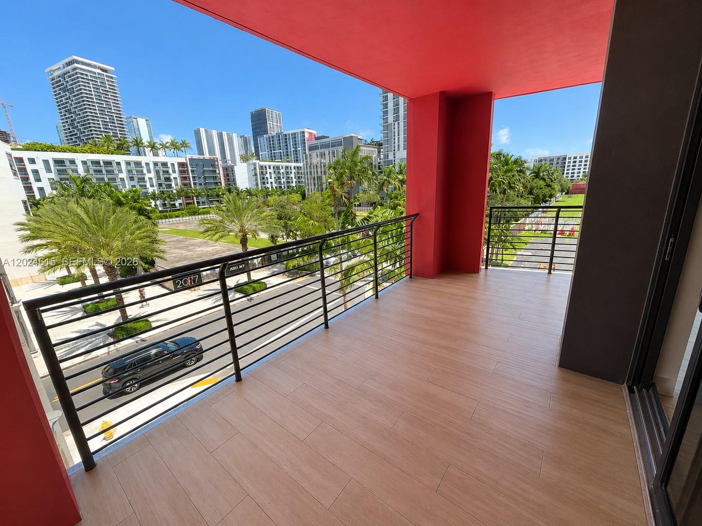90 Northeast 32nd Street, Unit 301 Miami, FL 33127 - Photo 2 of 21 a view of a balcony with outdoor space