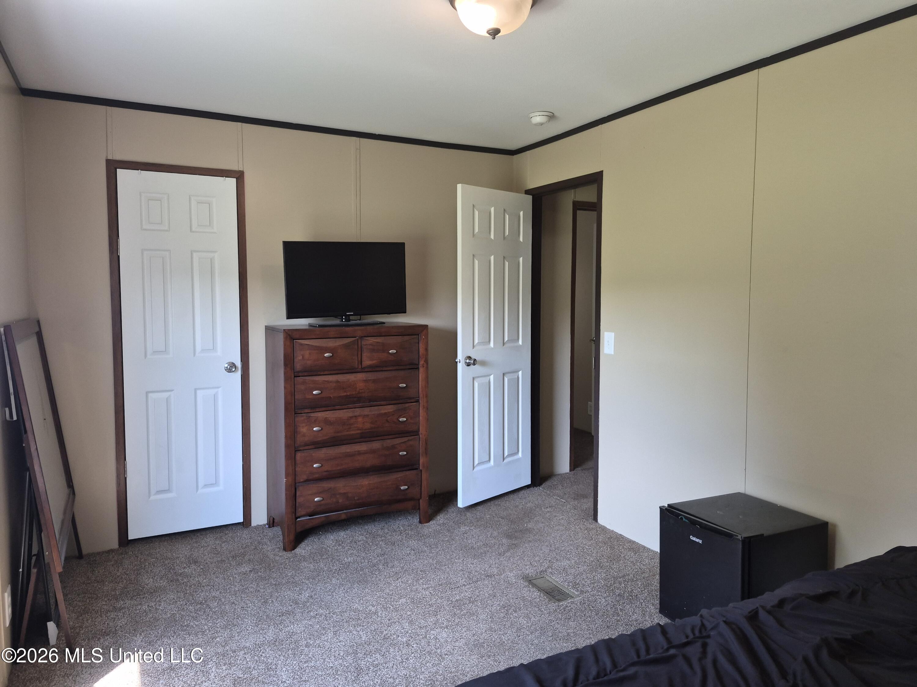 54 Ballard Road Perkinston, MS 39573 - Photo 25 of 35 Rear Corner Guest Room