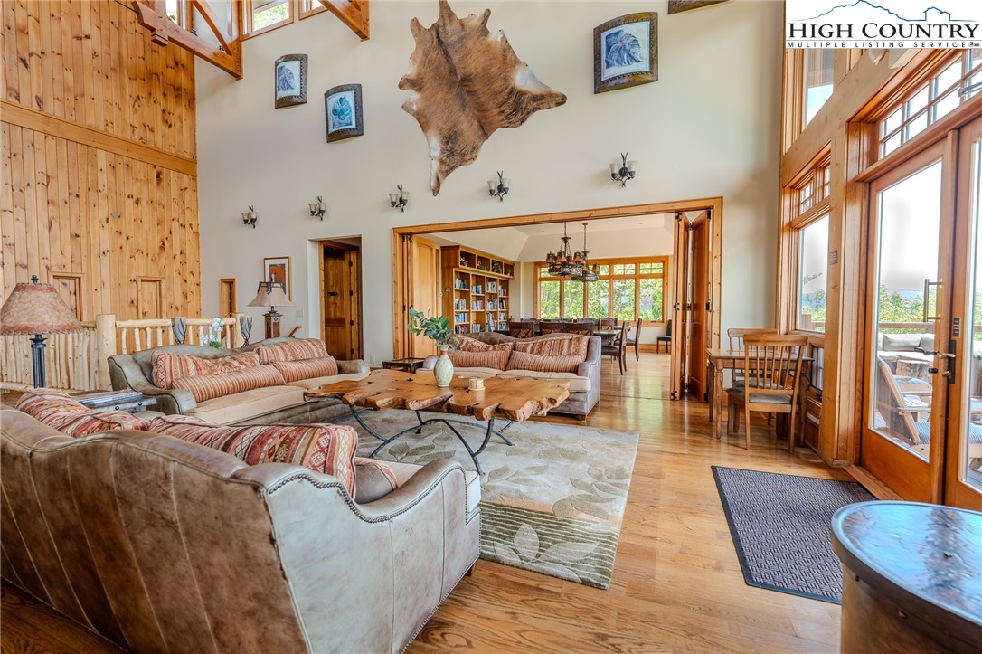 0 Beaver Dam Road Elk Park, NC 28622 - Photo 9 of 14 a living room with patio furniture and a large window