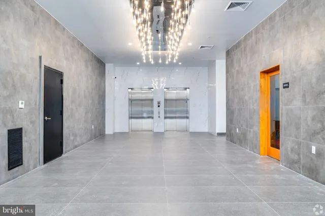 a front view of a building with a street