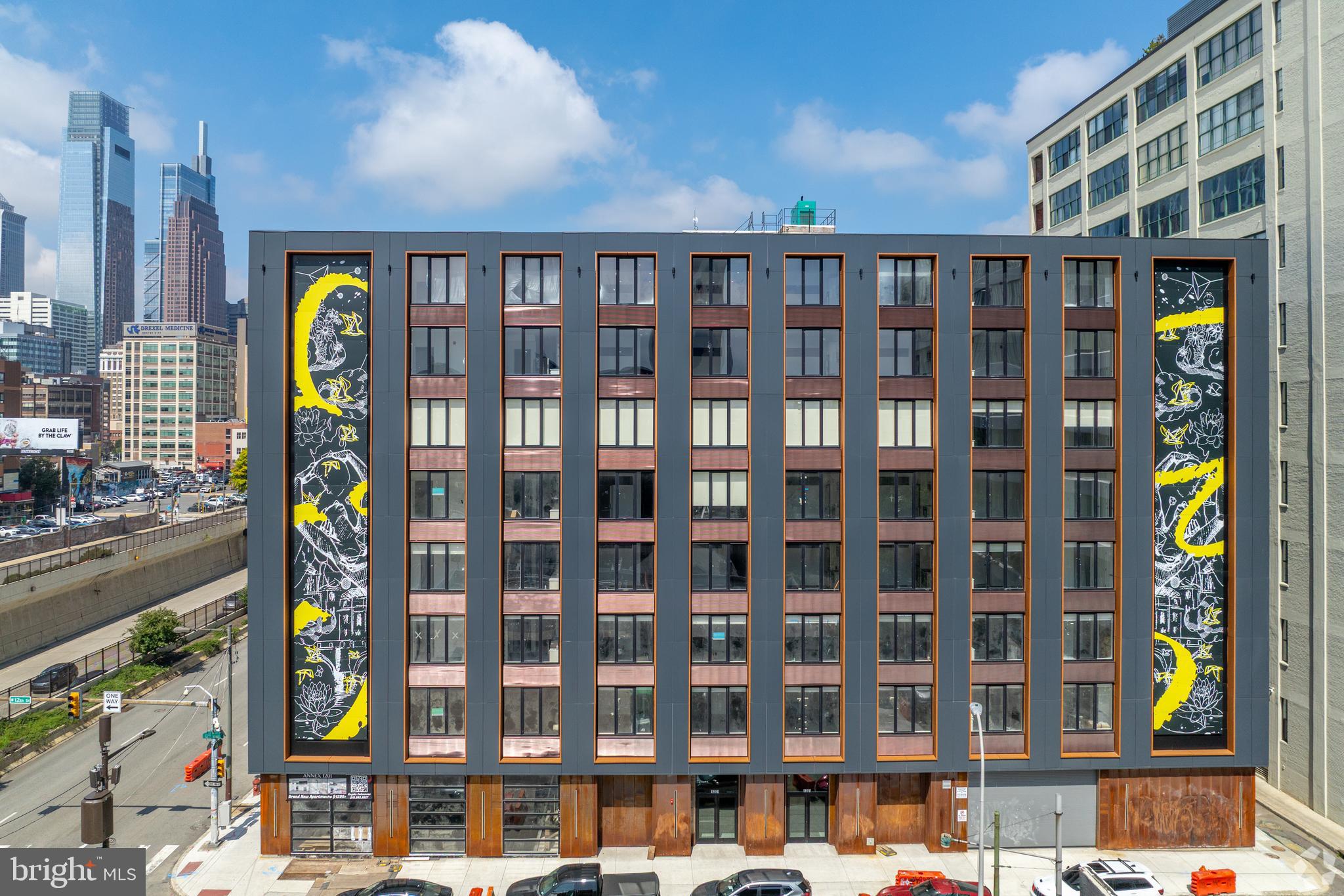 1201 Vine Street, Unit STUDIO Philadelphia, PA 19107 - Photo 24 of 29 a front view of a building with a street