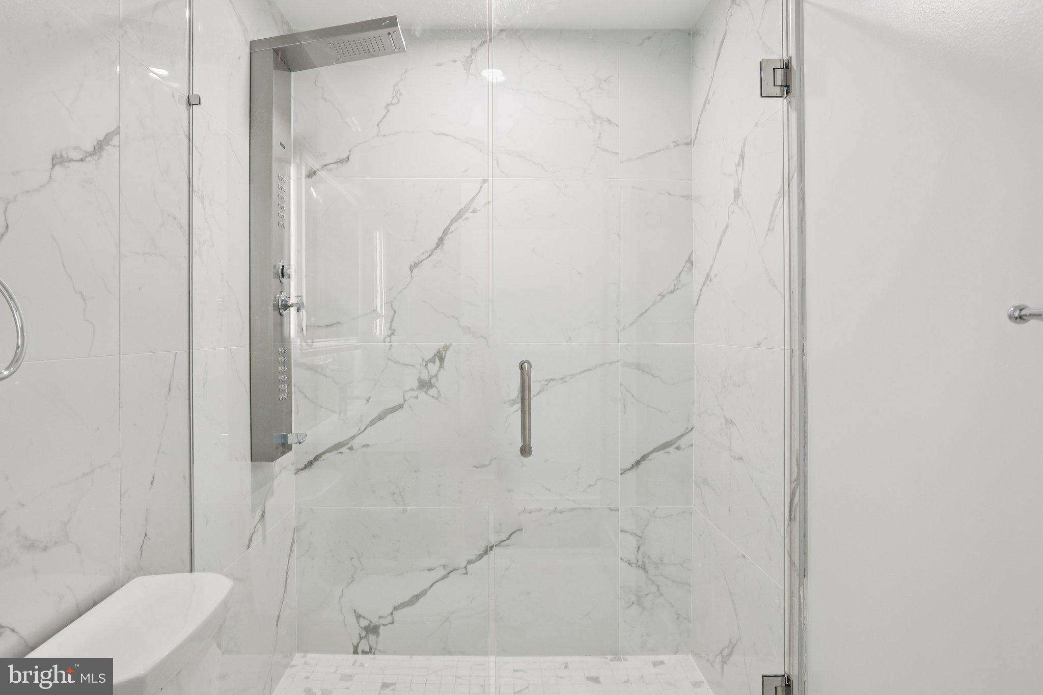 1201 Vine Street, Unit STUDIO Philadelphia, PA 19107 - Photo 4 of 29 a bathroom with a shower