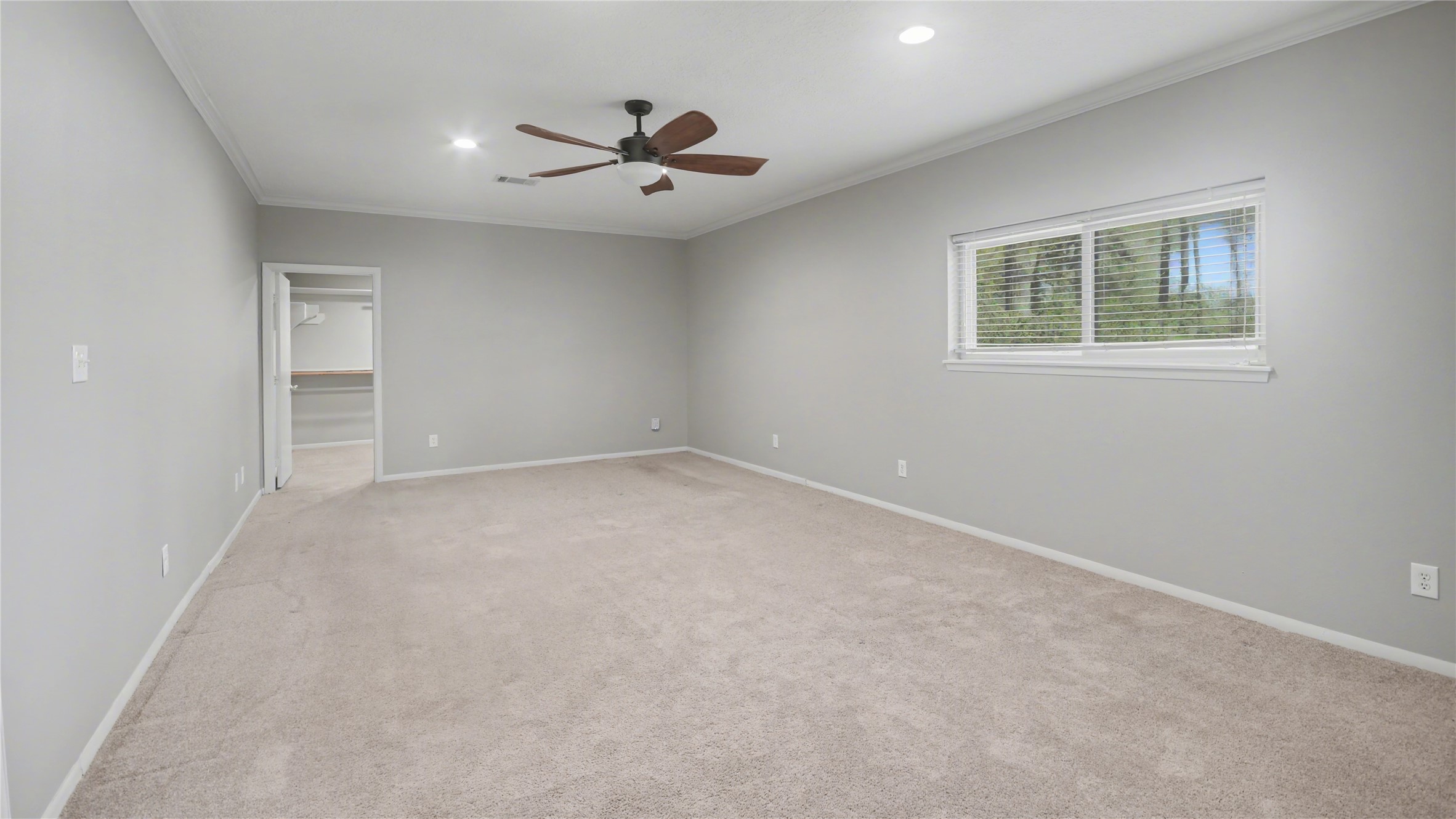 1431 Walnut Lane Houston, TX 77339 - Photo 14 of 47 Discover the spacious primary suite featuring a serene sitting area, perfect for relaxation and comfort.