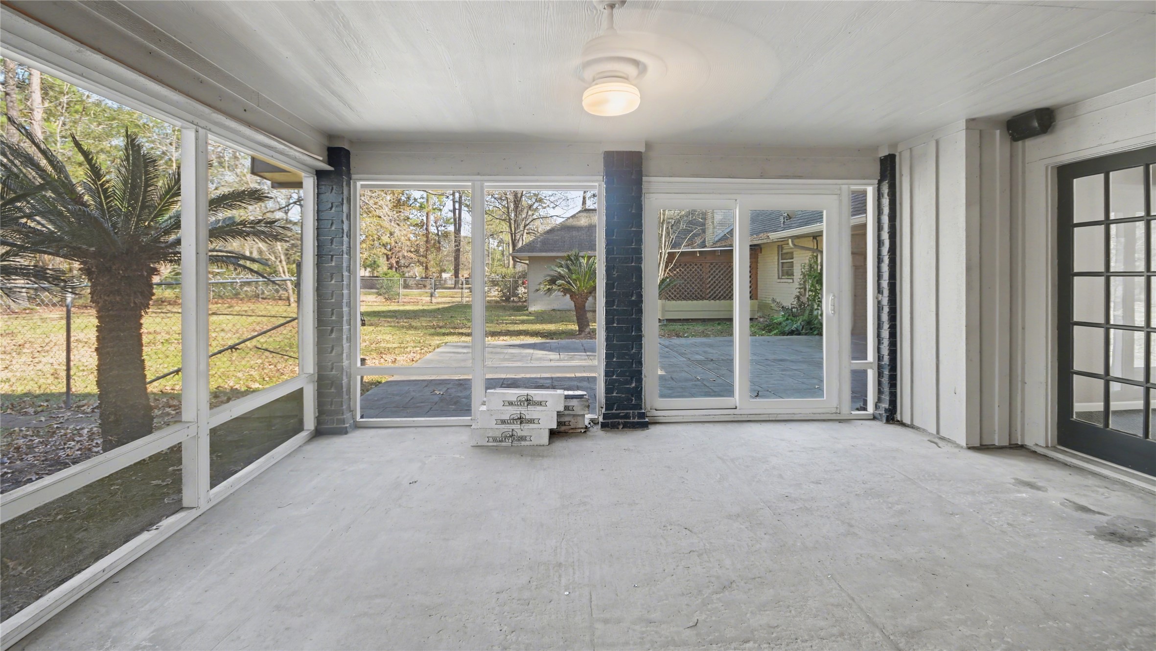 1431 Walnut Lane Houston, TX 77339 - Photo 40 of 46 Bright and inviting sunroom with expansive windows, offering serene views of the lush backyard. Perfect for relaxation or entertaining.