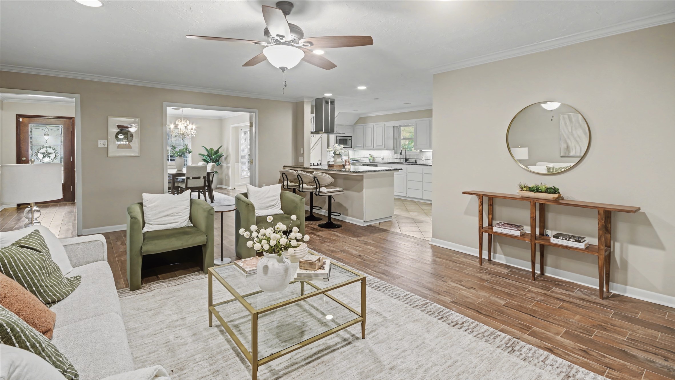 1431 Walnut Lane Houston, TX 77339 - Photo 7 of 44 Main living area positioned at the center of the home with easy access to the kitchen and surrounding spaces — designed for everyday use and gathering.